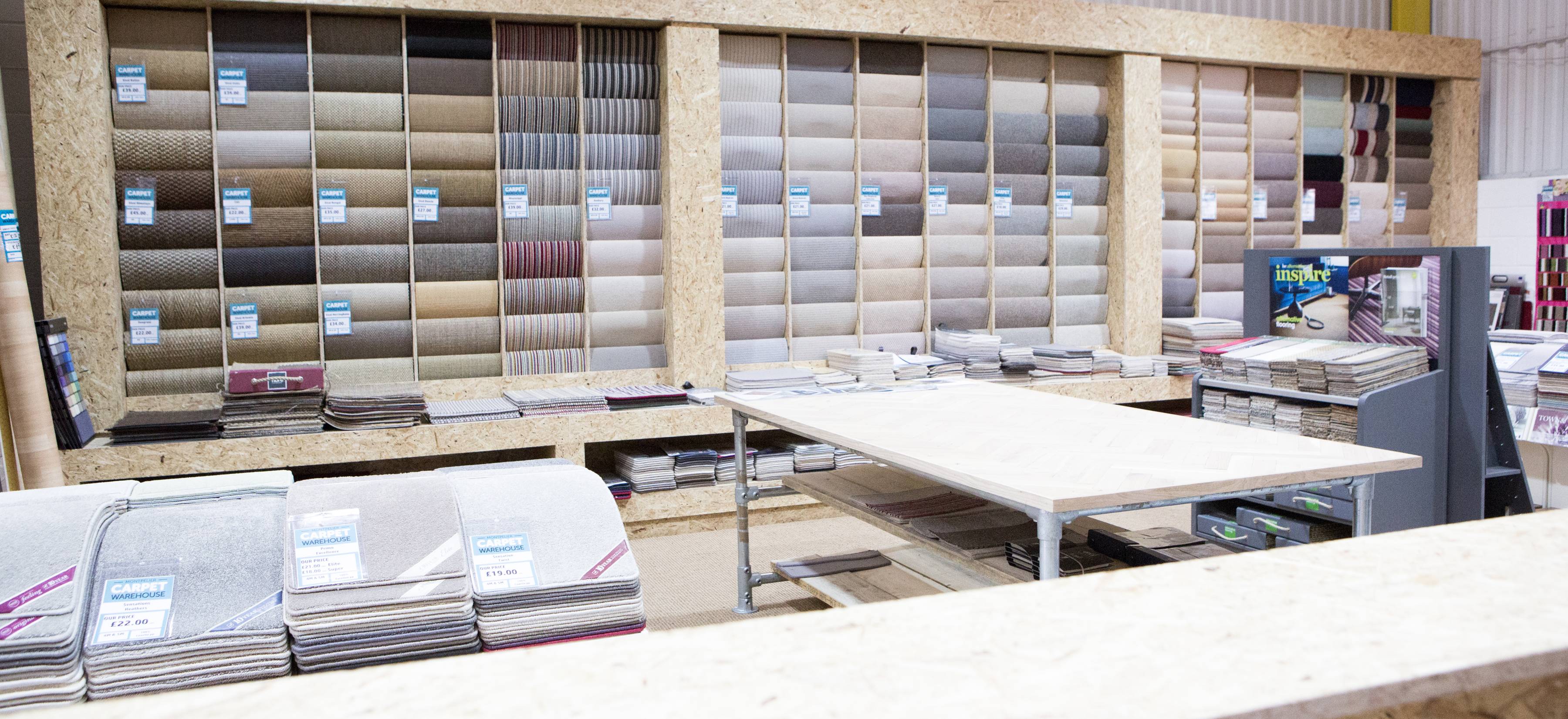 The full sample-book wall in the Montpelier showroom